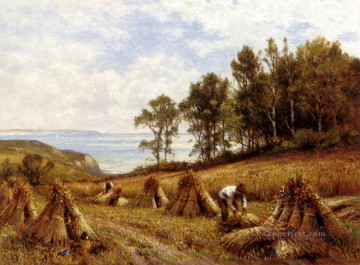 アルフレッド・グレンデニング Painting - ルッコンブ近くのトウモロコシ畑のワイト島の風景 アルフレッド・グレンデニング